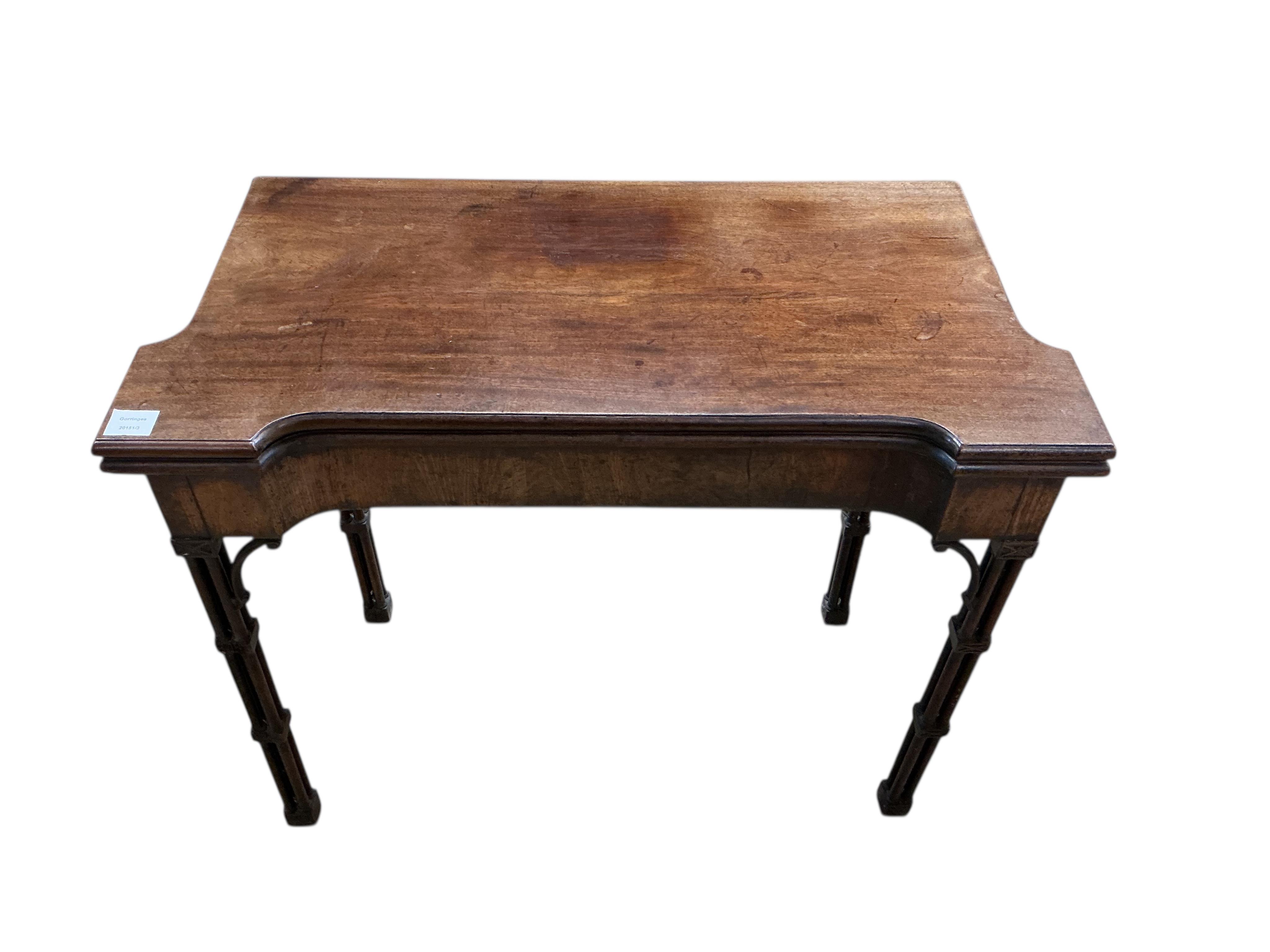 A George III Chippendale style mahogany folding card table on cluster column legs, width 90cm, depth 45cm, height 74cm